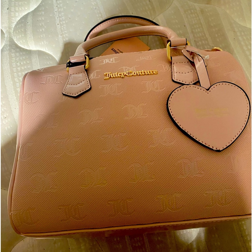 price reduction: Juicy Couture Pink Clay Best Seller Satchel